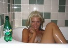 Charming woman in bath tub happy and gorgeous