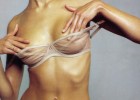 Skinny Keira Knightly touching her small bosoms getting undressed