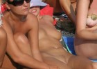 Crowded nudist beach full of girls expose their hot bosoms